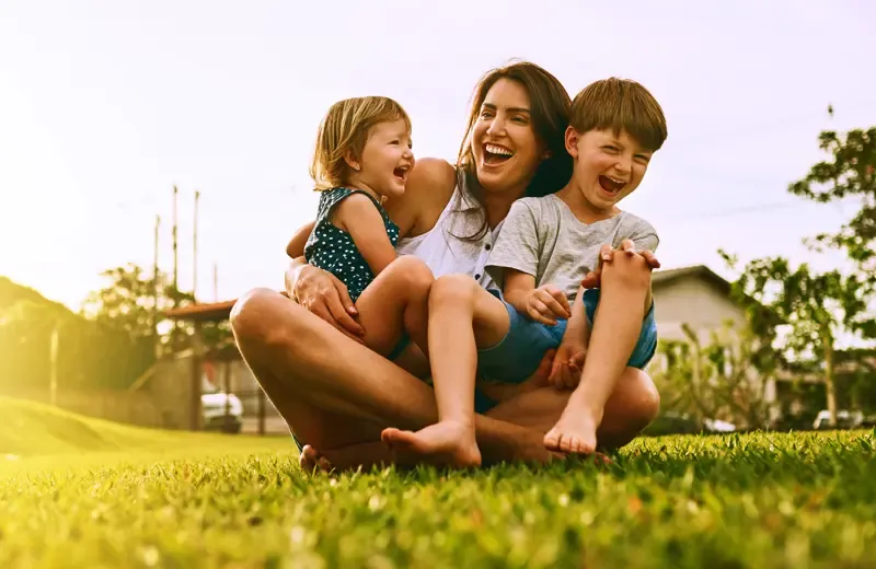 family and playing outside in grass