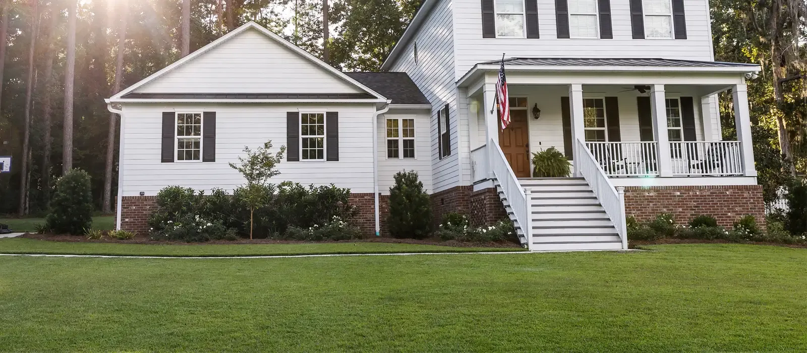 healthy green lawn in front of home
