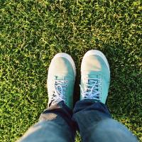 birds eye view of someones feet on grass