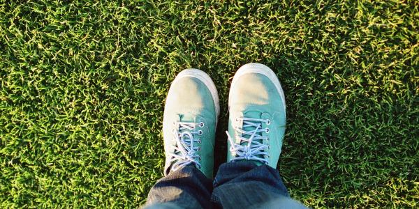 birds eye view of someones feet on grass